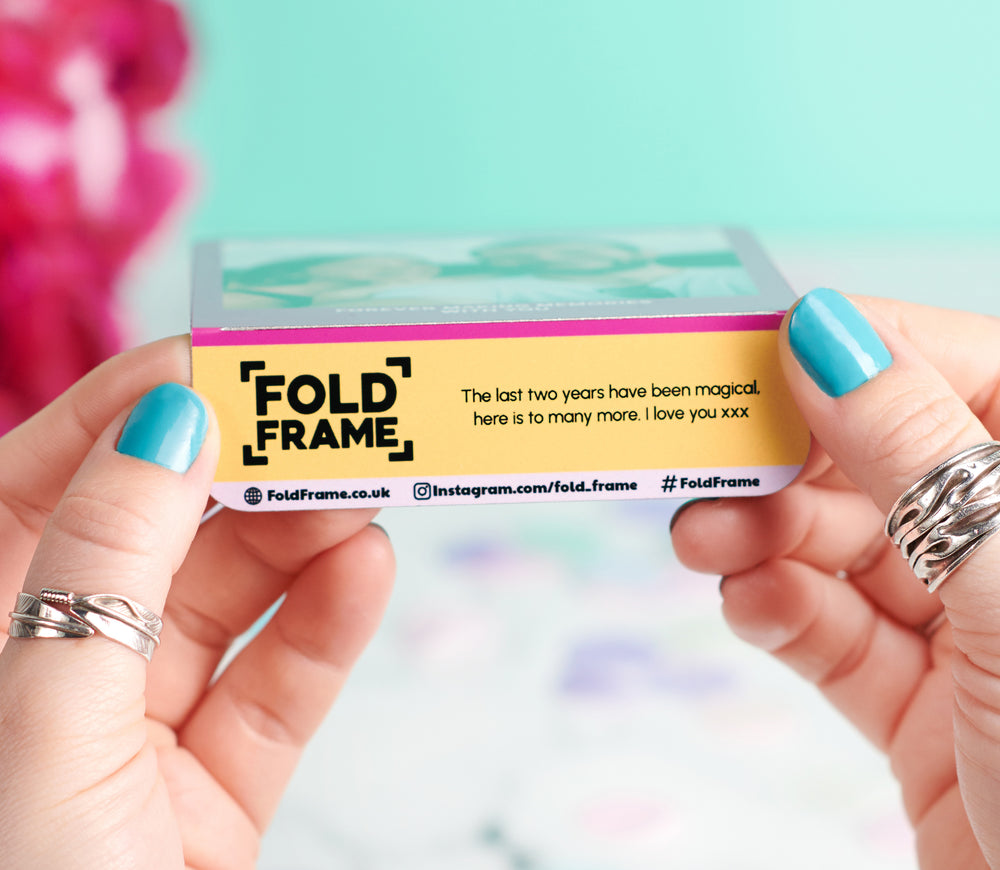 Personal message printed on the underside of a FoldFrame base