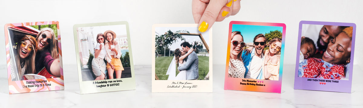Five colourful FoldFrame photo frames showing friends, a wedding and family memories